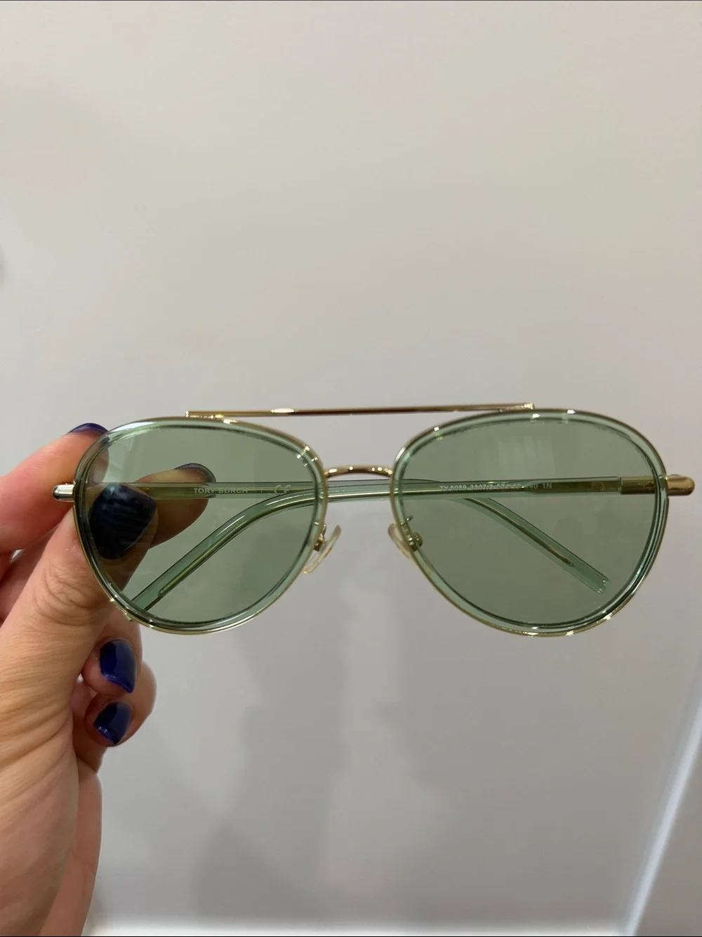 Tory Burch Gold Frame with Transparent Mint Lenses Aviator Sunglasses
